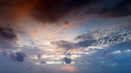 Fototapeta na wymiar Sunset with sun rays, sky with clouds and sun.