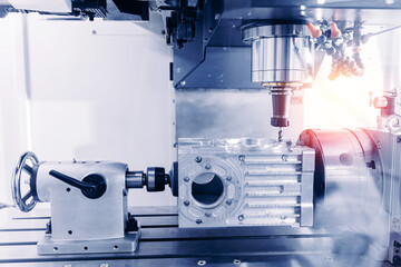 Auto CNC turning with robot drill milling factory with water coolant streams. Concept banner metal machine industry background. © Parilov