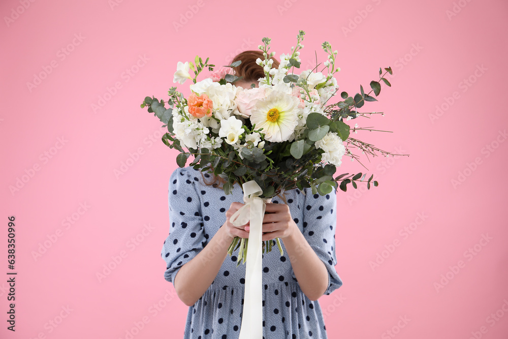 Sticker Woman covering her face with bouquet of beautiful flowers on pink background