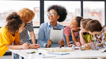Teacher and students with tablet