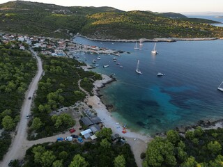 Vis Island, Italian Lissa, island of Croatia in the Adriatic Sea at sunset . It is the outermost...