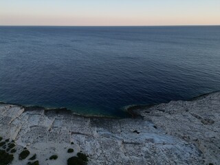 Vis Island, Italian Lissa, island of Croatia in the Adriatic Sea at sunset . It is the outermost...