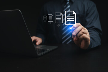 Person with document file hologram, businessman selecting data file on computer database stored, electronic file management. Managing data files on the database in an organized and secure way.