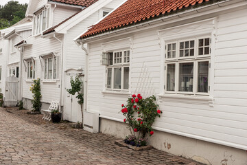 White wooden house in the old town of Mandal. Norway