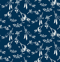 Cyanotype-style seamless pattern of blooming acacia branches; blue and white shrubs background