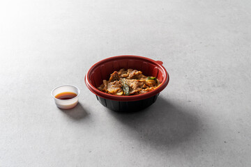 Soy sauce bulgogi, red pepper paste bulgogi over rice Korean food dish