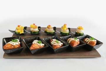 mini bites scallop mango salad and bbq prawn paste bread canapés butler in small plate in white background appetiser Christmas festival party halal food hotel cuisine restaurant menu