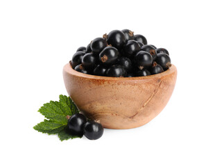 Ripe blackcurrants and leaf isolated on white