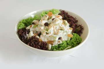 season green vegetables potato and fruit apple coleslaw w salad dressing sauce canapés butler in plate on white background appetiser Christmas festival party halal food hotel cuisine restaurant menu
