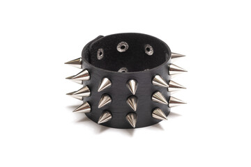 Black leather bracelet with spikes isolated on the white background.