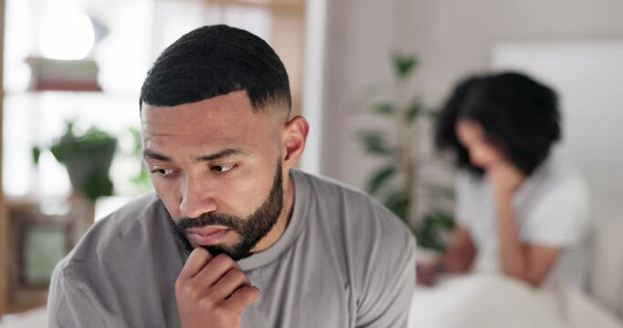 Divorce, fight and couple in a bed with anxiety, stress and conflict in their home together. Marriage, criss and man with commitment doubt, fear or erectile dysfunction in bedroom with cheating wife