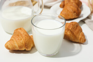 Breakfast tasty food concept - milk with bakery products