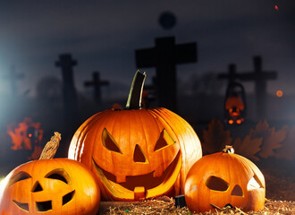 Eerie Halloween celebration: full moon, spooky tree, jack-o'-lantern, bats, black cat, candy treats, cemetery