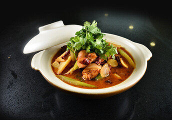 spicy mala laksa curry hot clay pot with seafood prawn, scallop, chicken meat, vegetable, noodle...