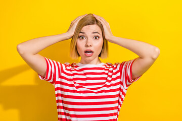 Photo of stressed depressed girl wear summer trendy clothes shocked bad news isolated on yellow...