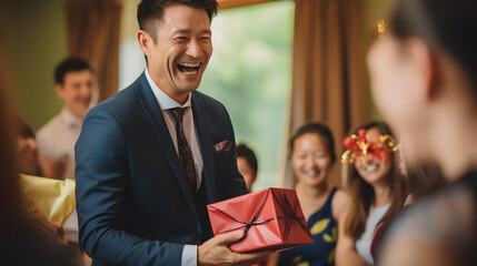Obraz premium A close-up captures the expressions of delight and surprise as the birthday celebrant receives a thoughtful gift. The photography emphasizes the emotions, creating a sense of intimacy.