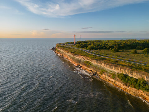 Steep shore on the north coast in Estonia in Paldiski at sunset in summer, photo from a drone.