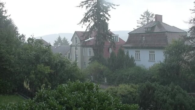 Heavy summer rain, European country houses, summer
