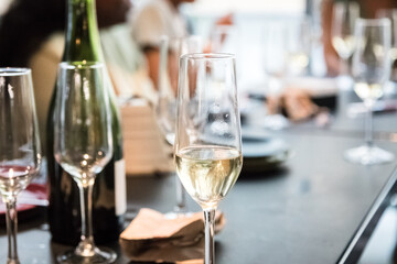 Bachelorette. Champagne and champagne glasses on a table. Party and social life concept. Selective focus
