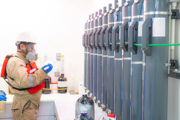 Man engrossed in marine studies aboard a research vessel
