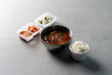 Korean food dish Cold noodles, spicy noodles, meat dumplings, kimchi dumplings, charcoal bulgogi, yukgaejang