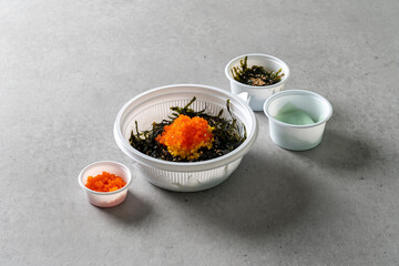 Beef gopchang gopdoritang, flying fish roe rice balls, and gopchang jeongol Korean food dish