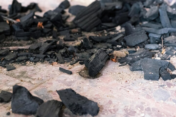 black charcoal on a floor