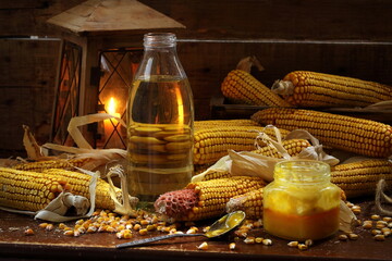 Corn oil on a wooden table