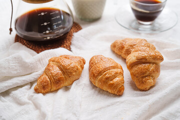 Croissant and coffee with milk