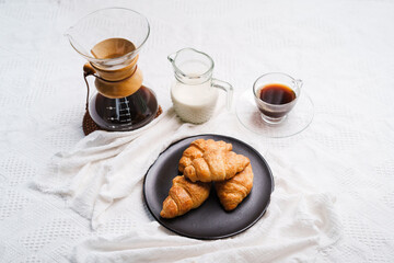 Croissant and coffee with milk