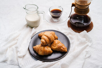Croissant and coffee with milk