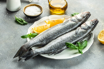 sea bass fish, Culinary seafood background. Restaurant menu, dieting, cookbook recipe top view - obrazy, fototapety, plakaty