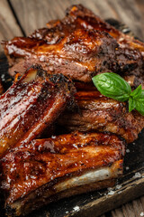 Pork ribs in barbecue sauce. vertical image. top view. place for text