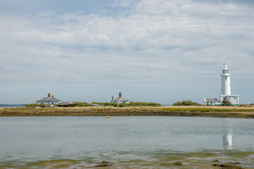 Hurst Point Lighthouse is located at Hurst Point in the English county of Hampshire, and guides vessels through the western approaches to the Solent