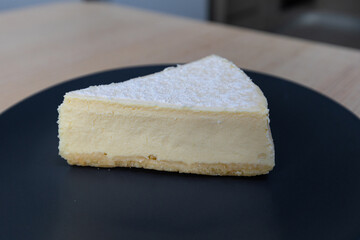A slice of delicious cheesecake.