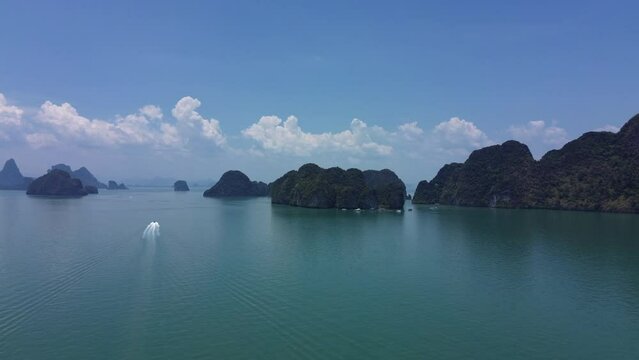 High limestone cliffs of Phang Nga Province, drone view of Panak Island in Phang Nga Bay