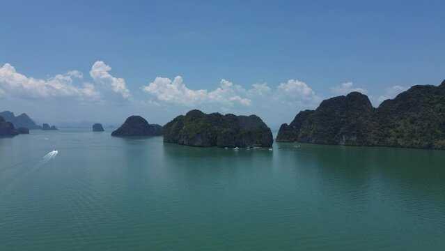 High limestone cliffs of Phang Nga Province, drone view of Panak Island in Phang Nga Bay