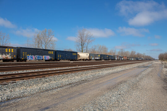 Walbridge, Ohio / USA -on April 21, 2019: View of CSX Transportation freight train container wagons on railway.