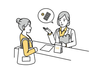 薬について説明する白衣を着た女性の薬剤師