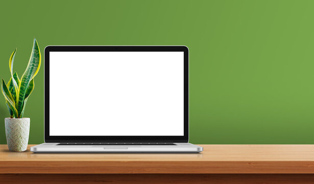 Laptop on wooden desk with background. Laptop or Computer mockup white background on table.