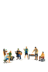 Miniature people are making barbeque, drinking beverages isolated on white background