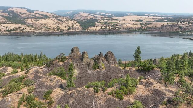The Columbia River Gorge is a federally protected scenic area forming the boundary between Washington and Oregon. The scenic area is a popular area for hiking, biking, fishing, and water sports.