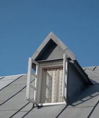 Metal roof with open window in Montenegro