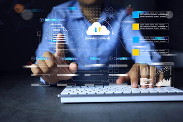 Document management system DMS concept. Businessman working with digital information on laptop computer on office to manage file on cloud storage and paperless workflow search engine system.