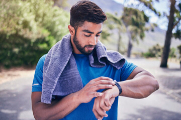 Pulse check, man and fitness watch with training results, towel and time monitoring of run outdoor....