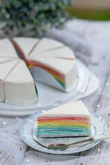piece of slice rainbow crepe cake