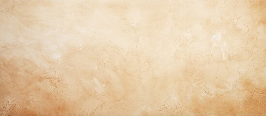 Close up of a vintage brown paper texture on a plain cream color cement wall showcasing beige and...