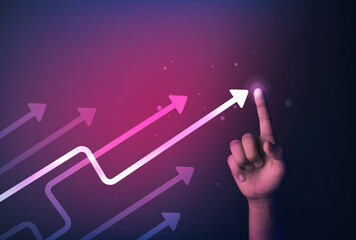 Hand pointing at business and investment arrow.