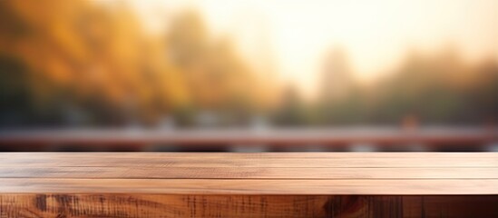 Blurry background with a close up of a wooden table