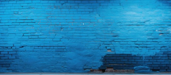 Blue painted brick wall with a panoramic view